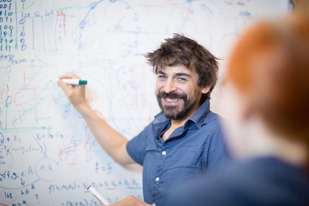 Ilya Shmulevich at his whiteboard