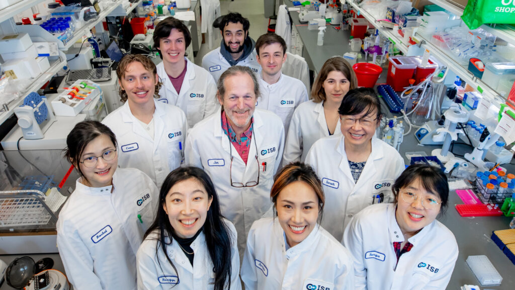 Dr. Jim Heath pictured with members of the Heath Lab in 2024 at ISB