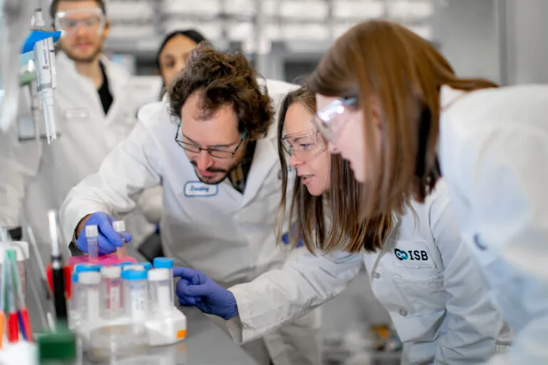 Members of the Kuchina Lab working at ISB in Seattle. (Photography by Scott Eklund/Red Box Pictures)