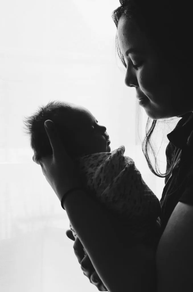 woman holding baby